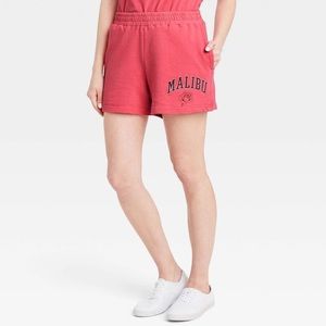 Mighty Fine brand sweat shorts in pink. Size medium